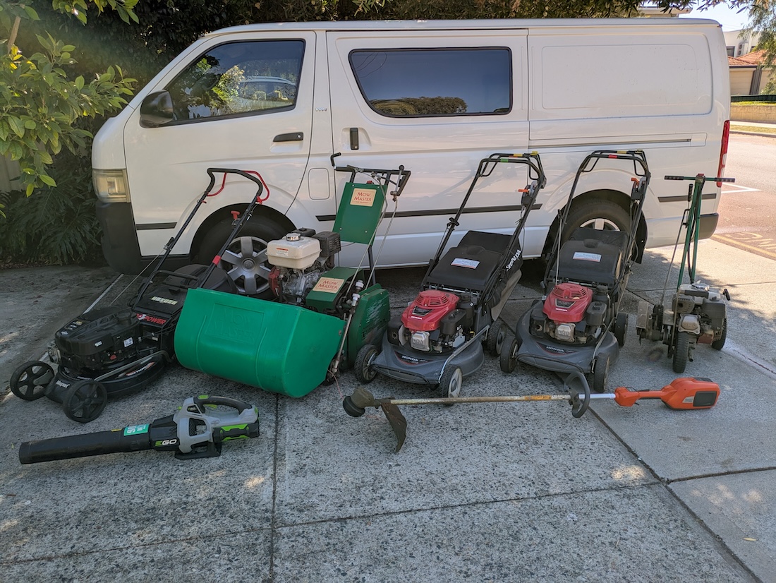 my professional lawn mowing equipment and work van